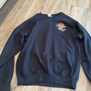 I’m selling a black crewneck.